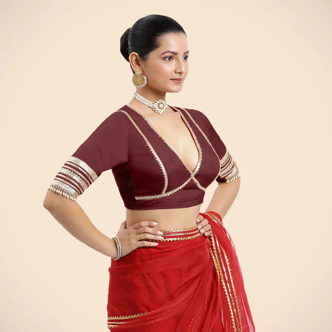 Nafeeza x Tyohaar | Burgundy Embellished Elbow Sleeves FlexiFit™ Saree Blouse with Plunging V Neckline with Tasteful Golden Gota Lace
