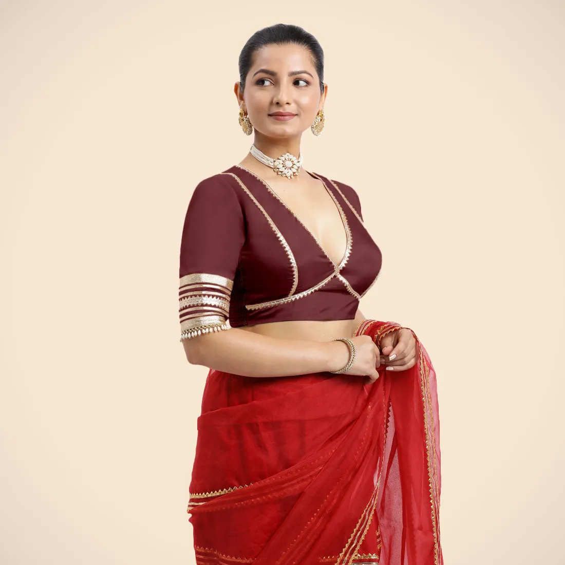 Nafeeza x Tyohaar | Burgundy Embellished Elbow Sleeves FlexiFit™ Saree Blouse with Plunging V Neckline with Tasteful Golden Gota Lace