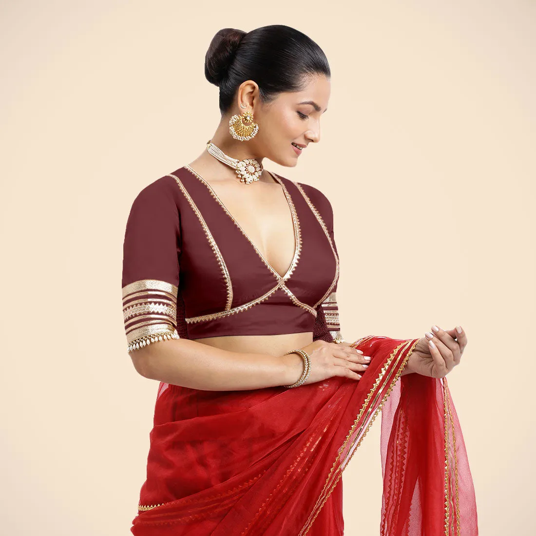 Nafeeza x Tyohaar | Burgundy Embellished Elbow Sleeves FlexiFit™ Saree Blouse with Plunging V Neckline with Tasteful Golden Gota Lace