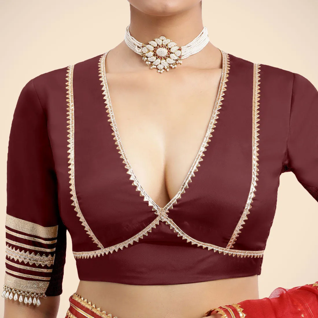 Nafeeza x Tyohaar | Burgundy Embellished Elbow Sleeves FlexiFit™ Saree Blouse with Plunging V Neckline with Tasteful Golden Gota Lace