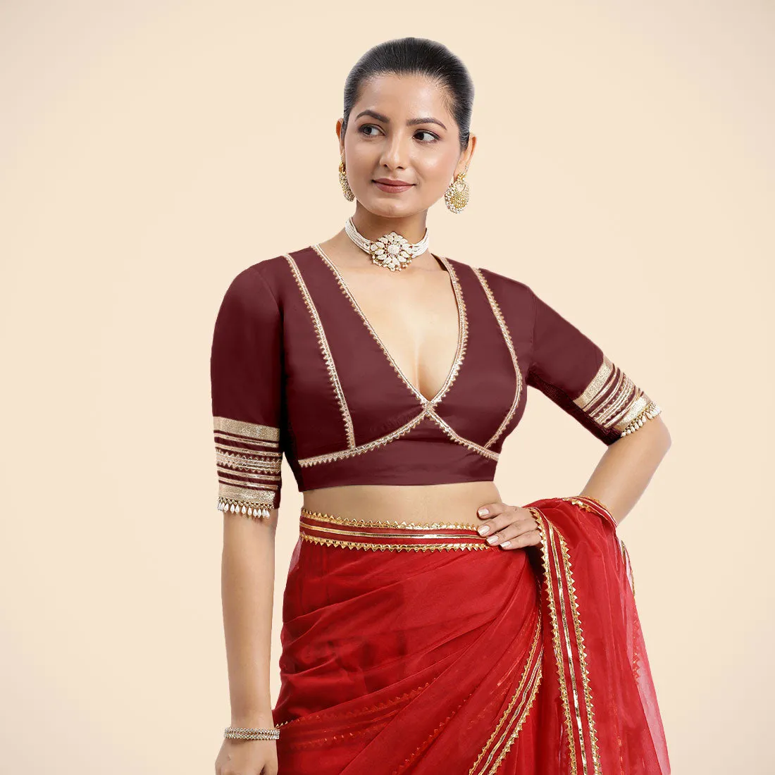 Nafeeza x Tyohaar | Burgundy Embellished Elbow Sleeves FlexiFit™ Saree Blouse with Plunging V Neckline with Tasteful Golden Gota Lace