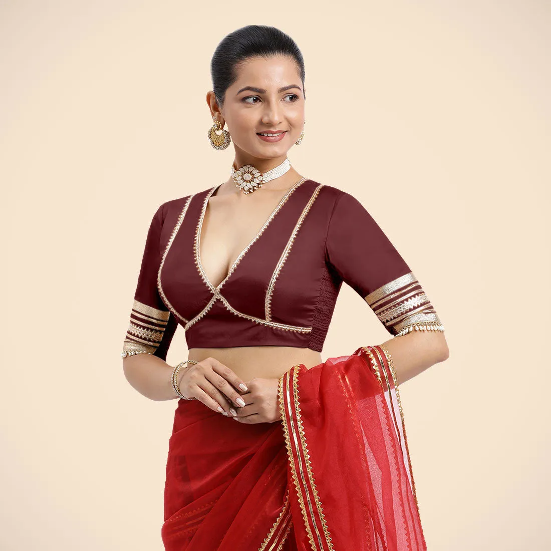 Nafeeza x Tyohaar | Burgundy Embellished Elbow Sleeves FlexiFit™ Saree Blouse with Plunging V Neckline with Tasteful Golden Gota Lace